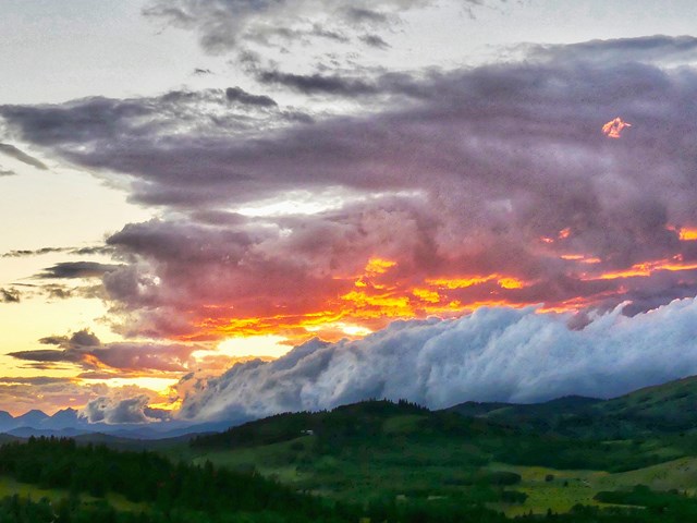 Sunset storm rolling in over the neighboring hills.